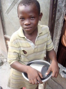 Haitian Boy with Food Bowl